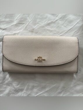 Coach Pebbled Leather Clutch Wallet in Light Beige